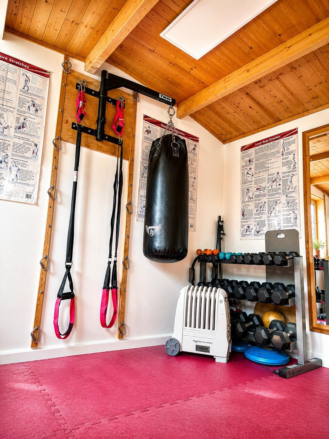 Punch bag, suspension trainers and dumbbells